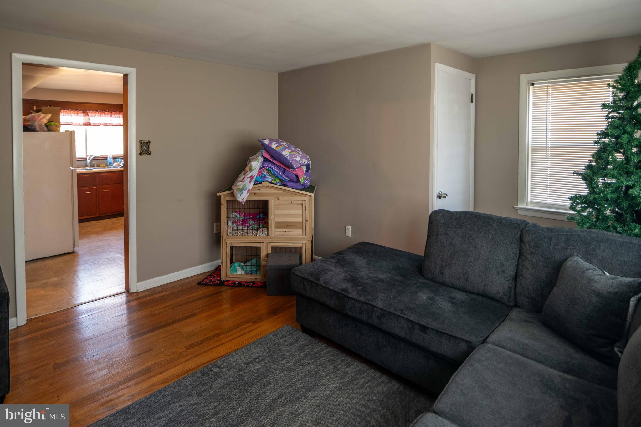 5273 Denlinger Road Gap, PA 17527 - Photo 14 of 54 a living room with furniture and a wooden floor