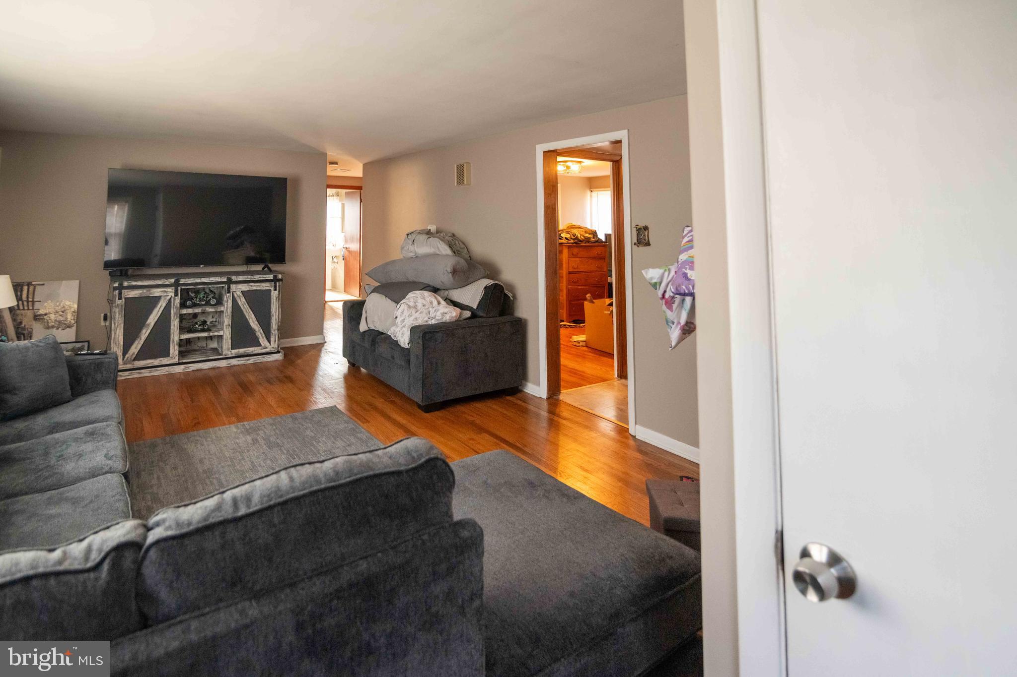 5273 Denlinger Road Gap, PA 17527 - Photo 17 of 54 a living room with furniture and a flat screen tv