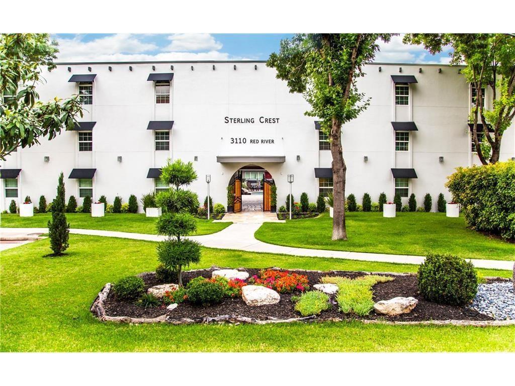 3110 Red River Street, Unit D315 Austin, TX 78705 - Photo 2 of 12 a front view of a house with garden