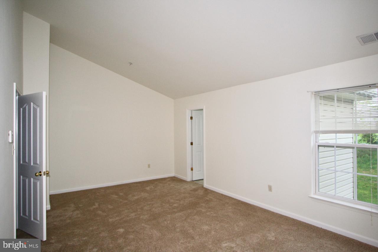 17626 Potter Bell Way Hagerstown, MD 21740 - Photo 12 of 21 an empty room with windows