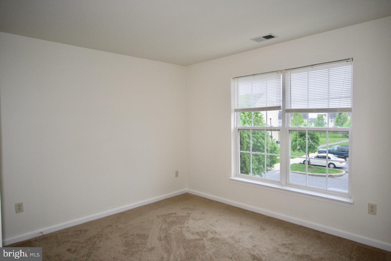 17626 Potter Bell Way Hagerstown, MD 21740 - Photo 17 of 21 an empty room with a window