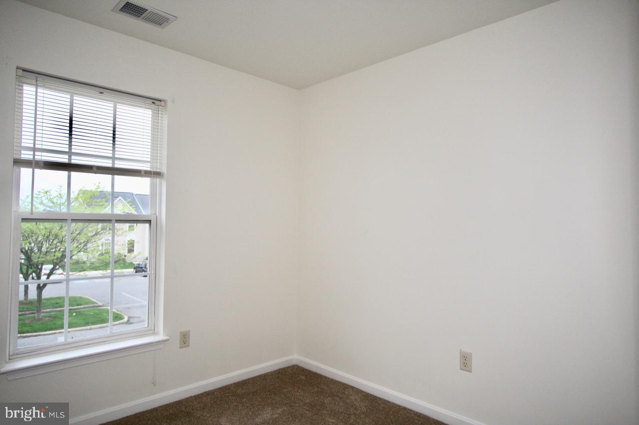 17626 Potter Bell Way Hagerstown, MD 21740 - Photo 18 of 21 an empty room with a window