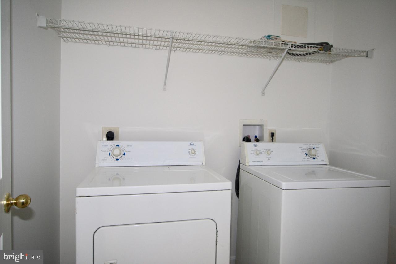 17626 Potter Bell Way Hagerstown, MD 21740 - Photo 7 of 21 a utility room with dryer and washer