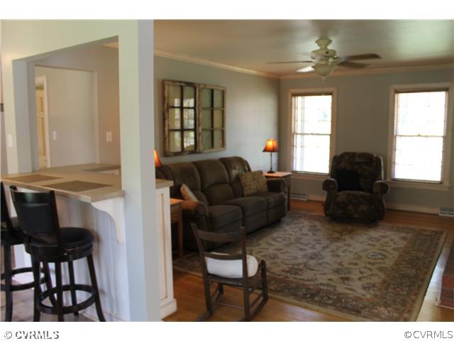 2700 Salisbury Road Midlothian, VA 23113 - Photo 11 of 17 a living room with furniture and a flat screen tv