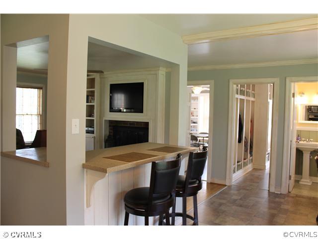 2700 Salisbury Road Midlothian, VA 23113 - Photo 8 of 17 a view of a dining room with furniture and wooden floor