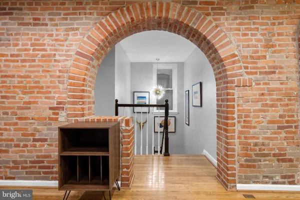 a view of entryway with wooden floor