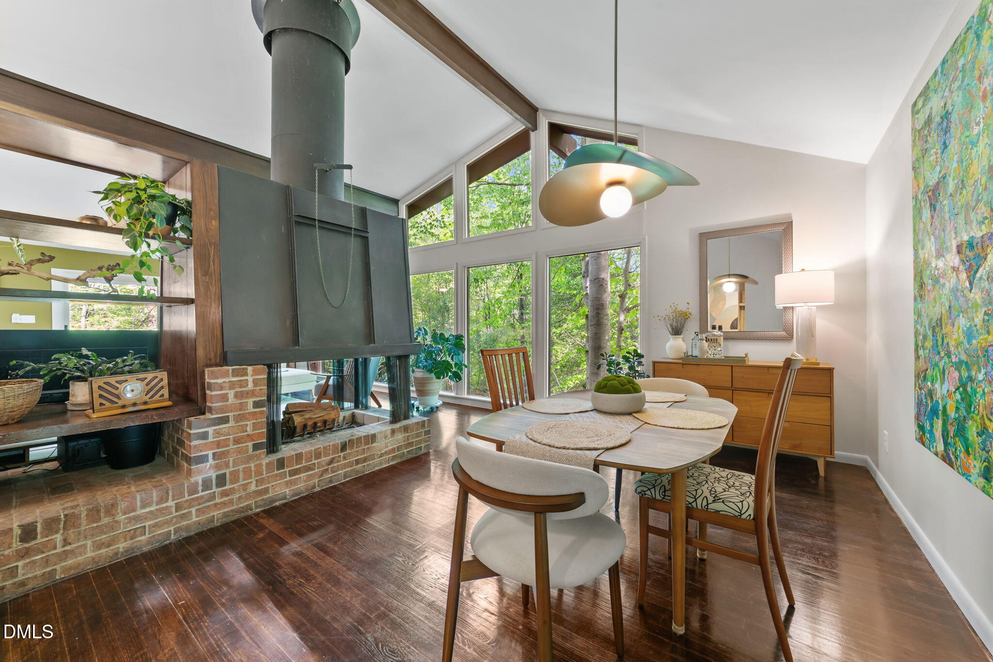 105 Barcliff Terrace Cary, NC 27518 - Photo 3 of 47 a view of a dining room with furniture wooden floor and a chandelier