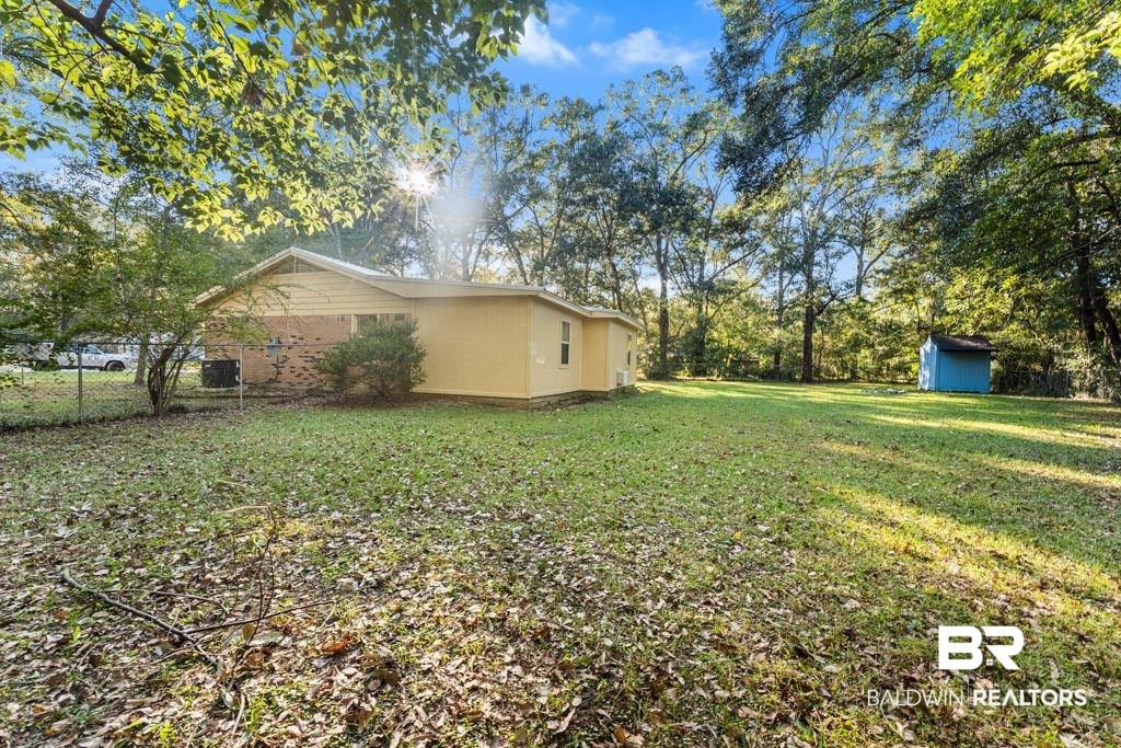 5551 Springer Court Theodore, AL 36582 - Photo 8 of 37 View of yard