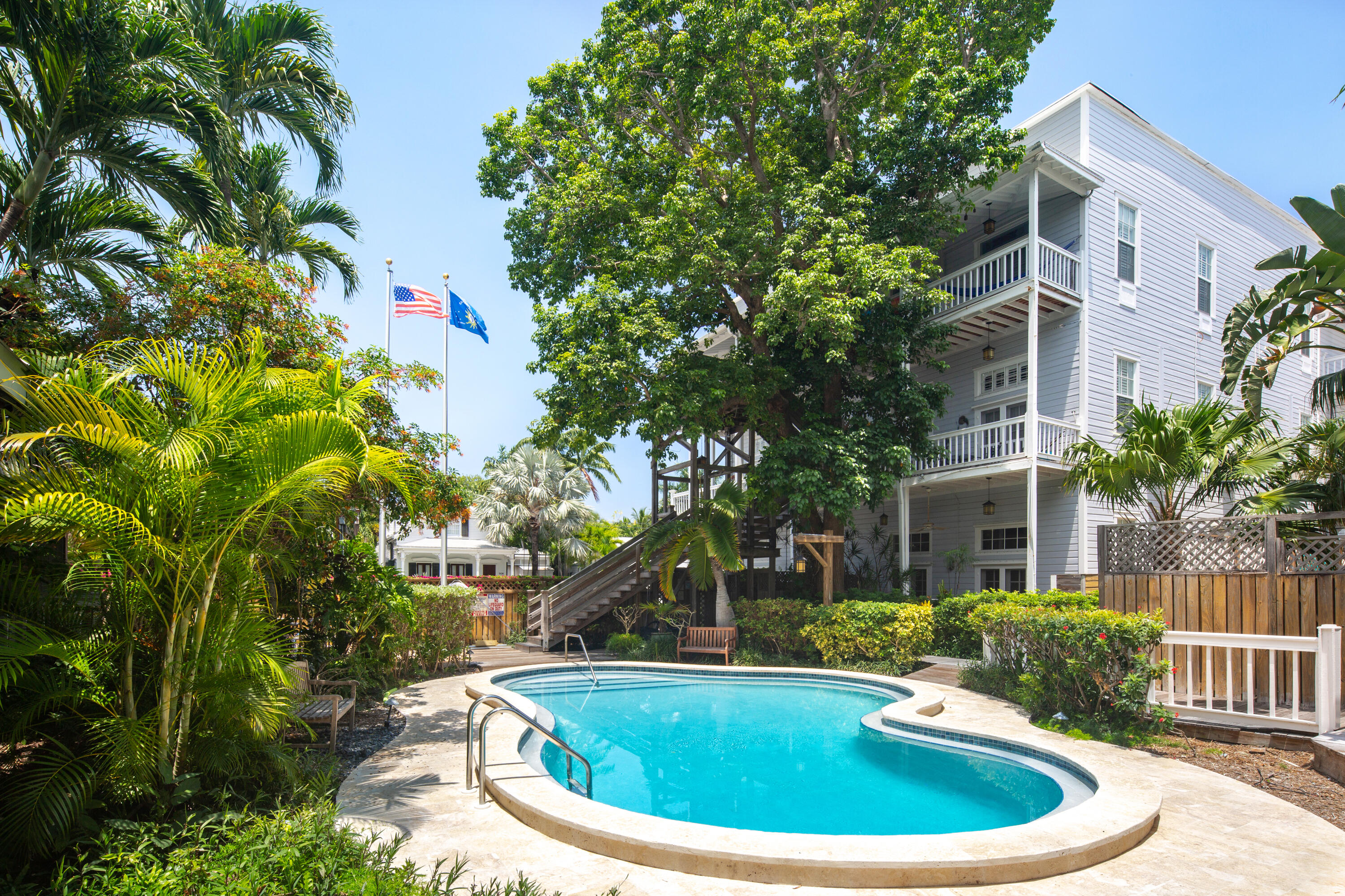 800 Fleming Street, Unit C2 Key West, FL 33040 - Photo 2 of 41 a view of outdoor space yard and tree