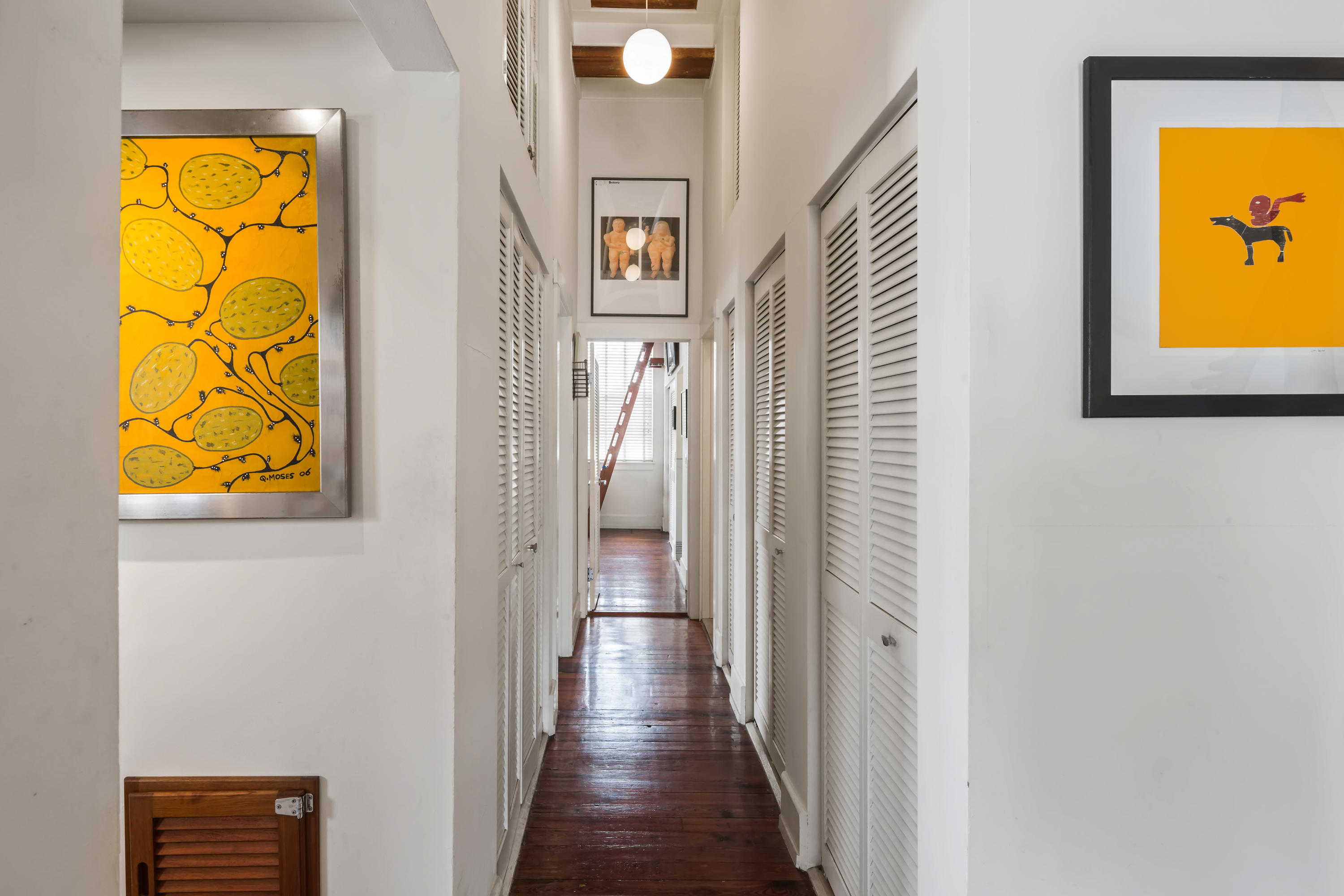 800 Fleming Street, Unit C2 Key West, FL 33040 - Photo 20 of 41 a view of a hallway with wooden floor and windows