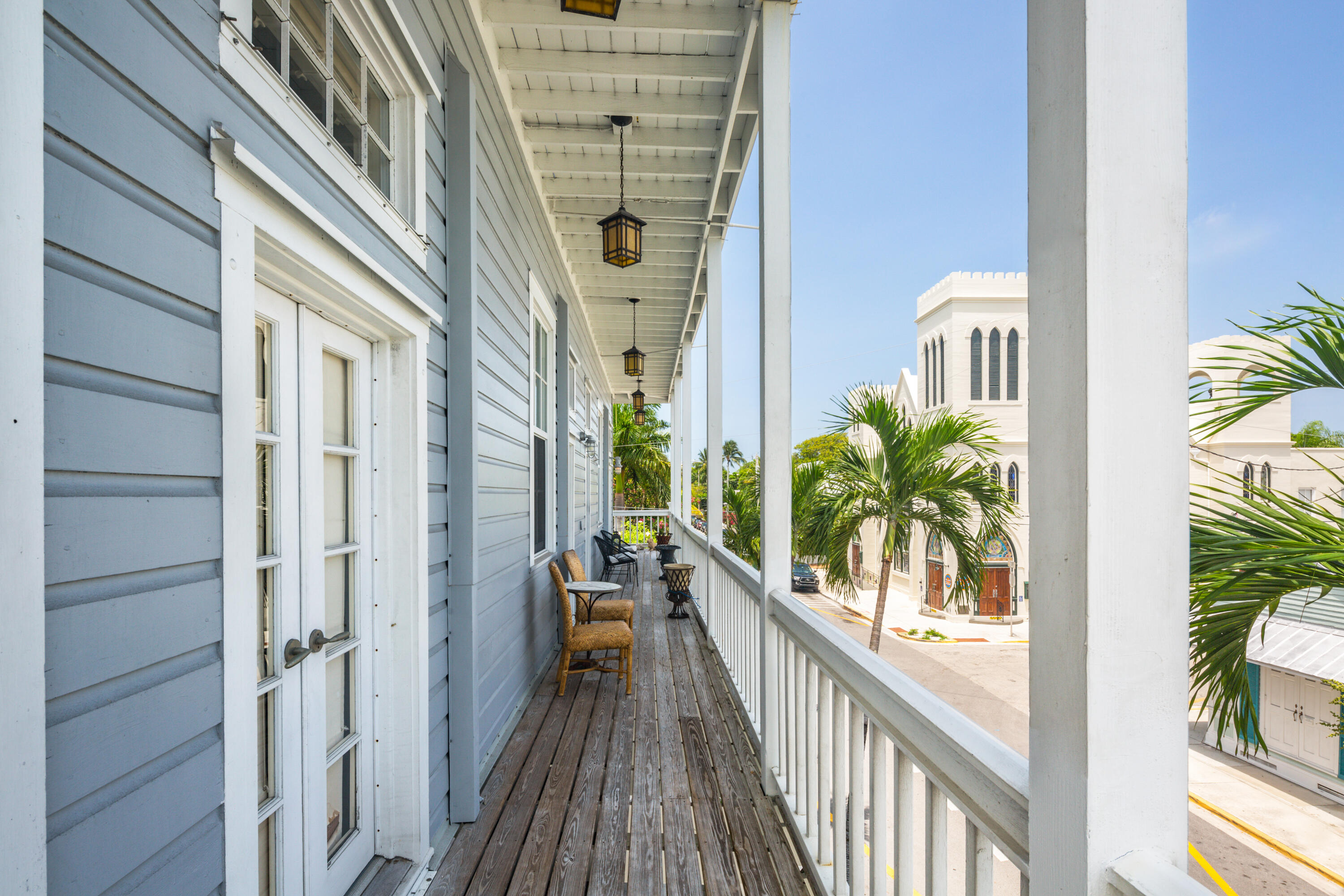 800 Fleming Street, Unit C2 Key West, FL 33040 - Photo 26 of 41 a view of a balcony with potted plants