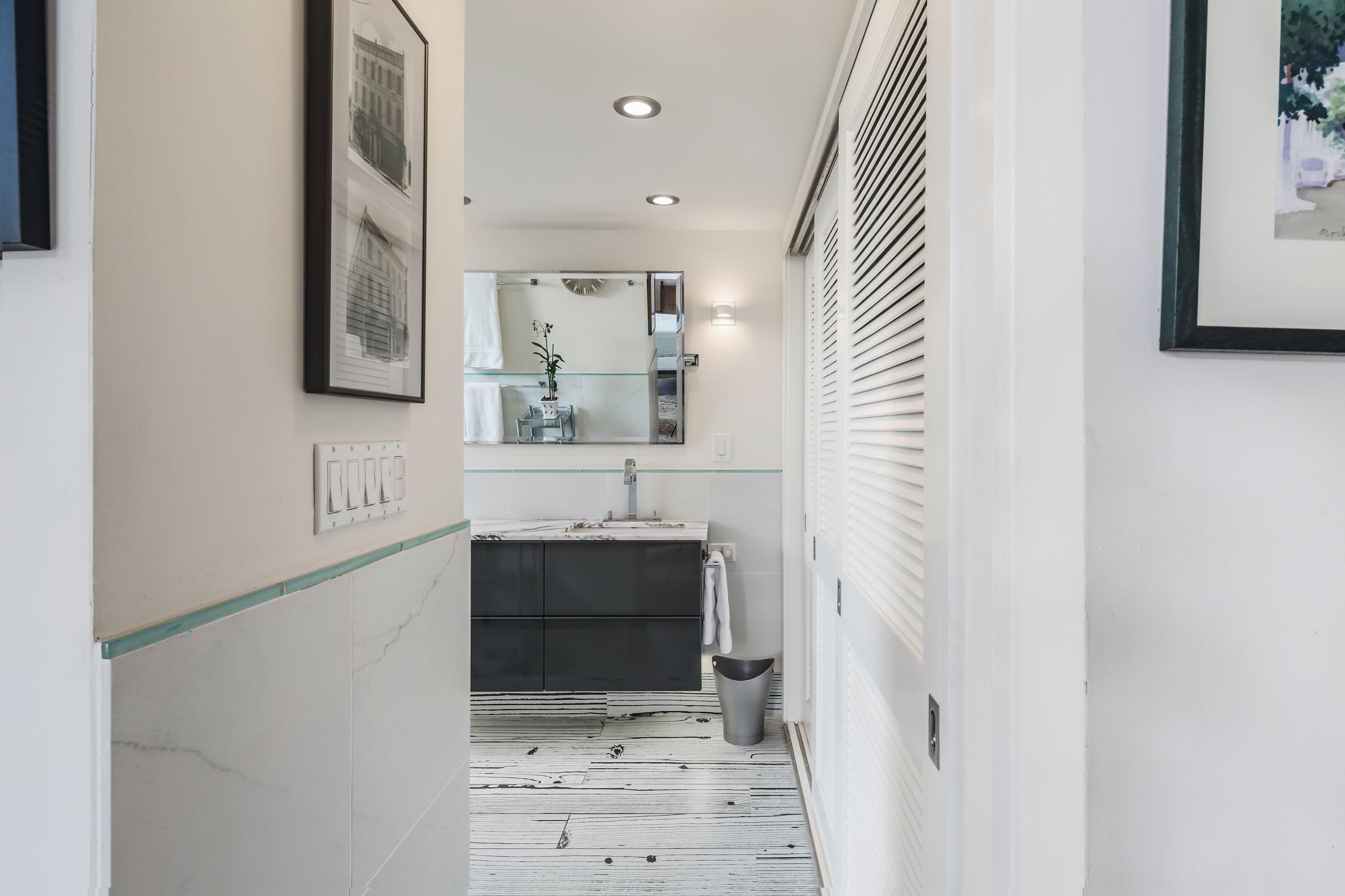 800 Fleming Street, Unit C2 Key West, FL 33040 - Photo 27 of 41 a bathroom with a sink and a mirror