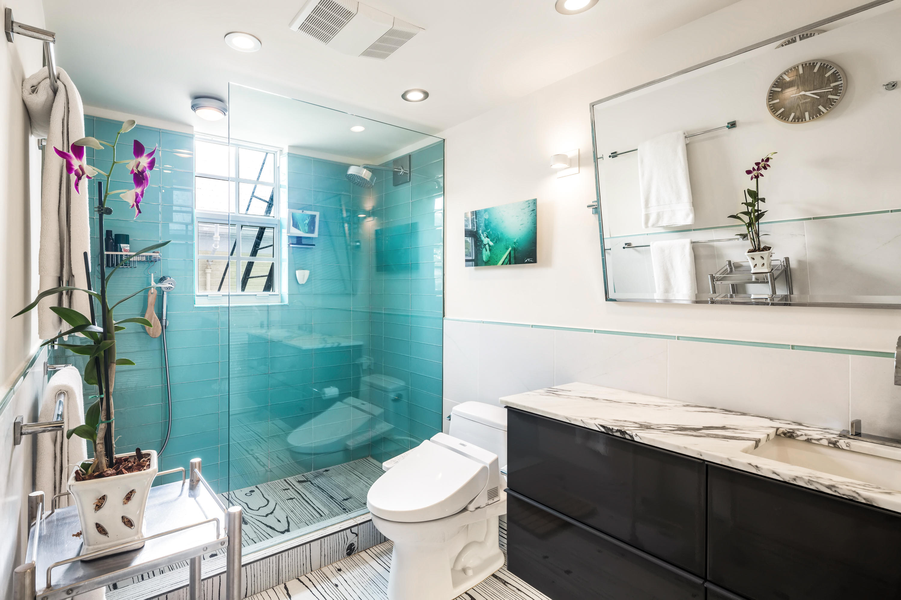 800 Fleming Street, Unit C2 Key West, FL 33040 - Photo 28 of 41 a bathroom with a sink vanity mirror and toilet