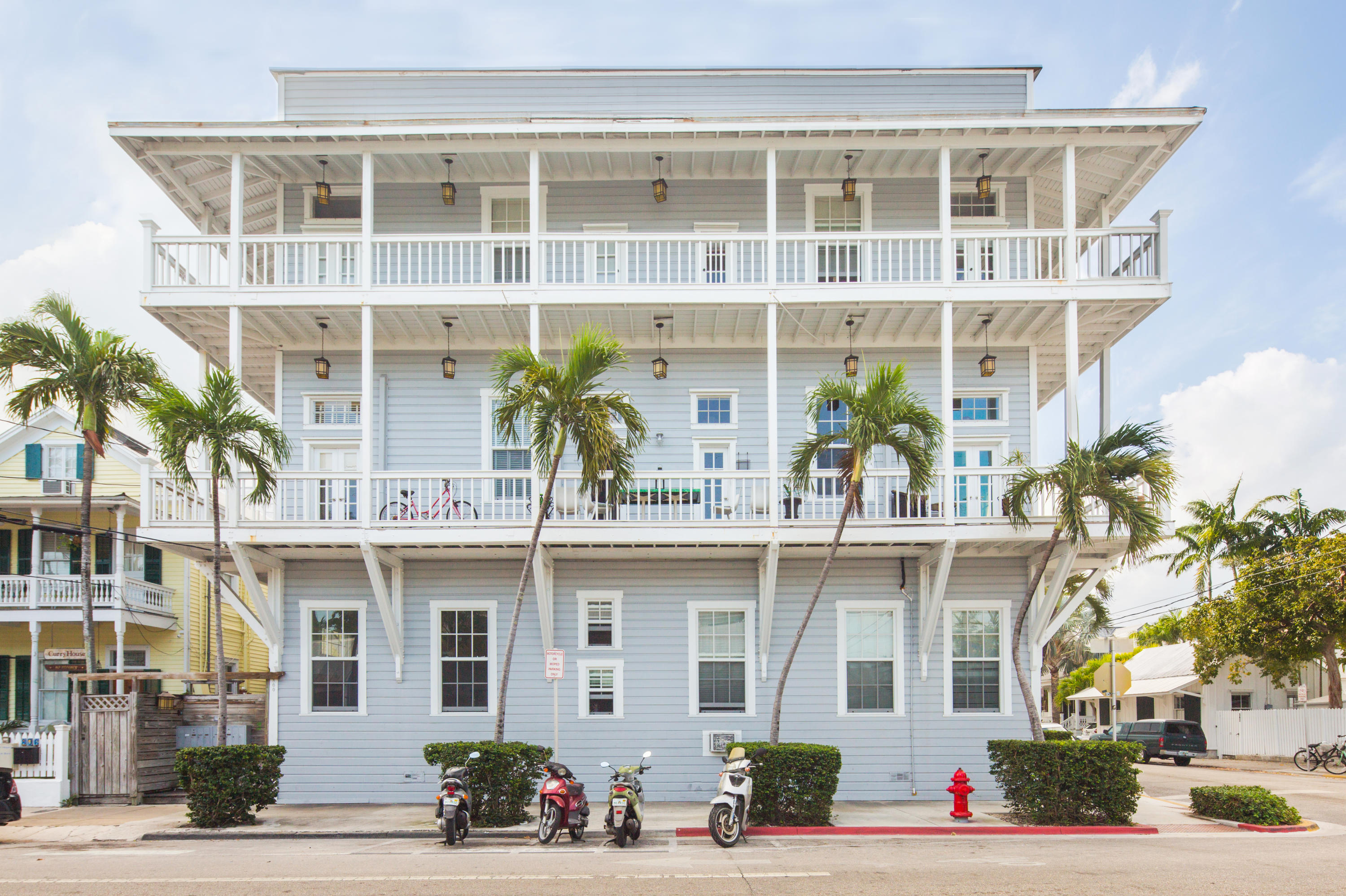 800 Fleming Street, Unit C2 Key West, FL 33040 - Photo 4 of 41 a front view of a building with a garden