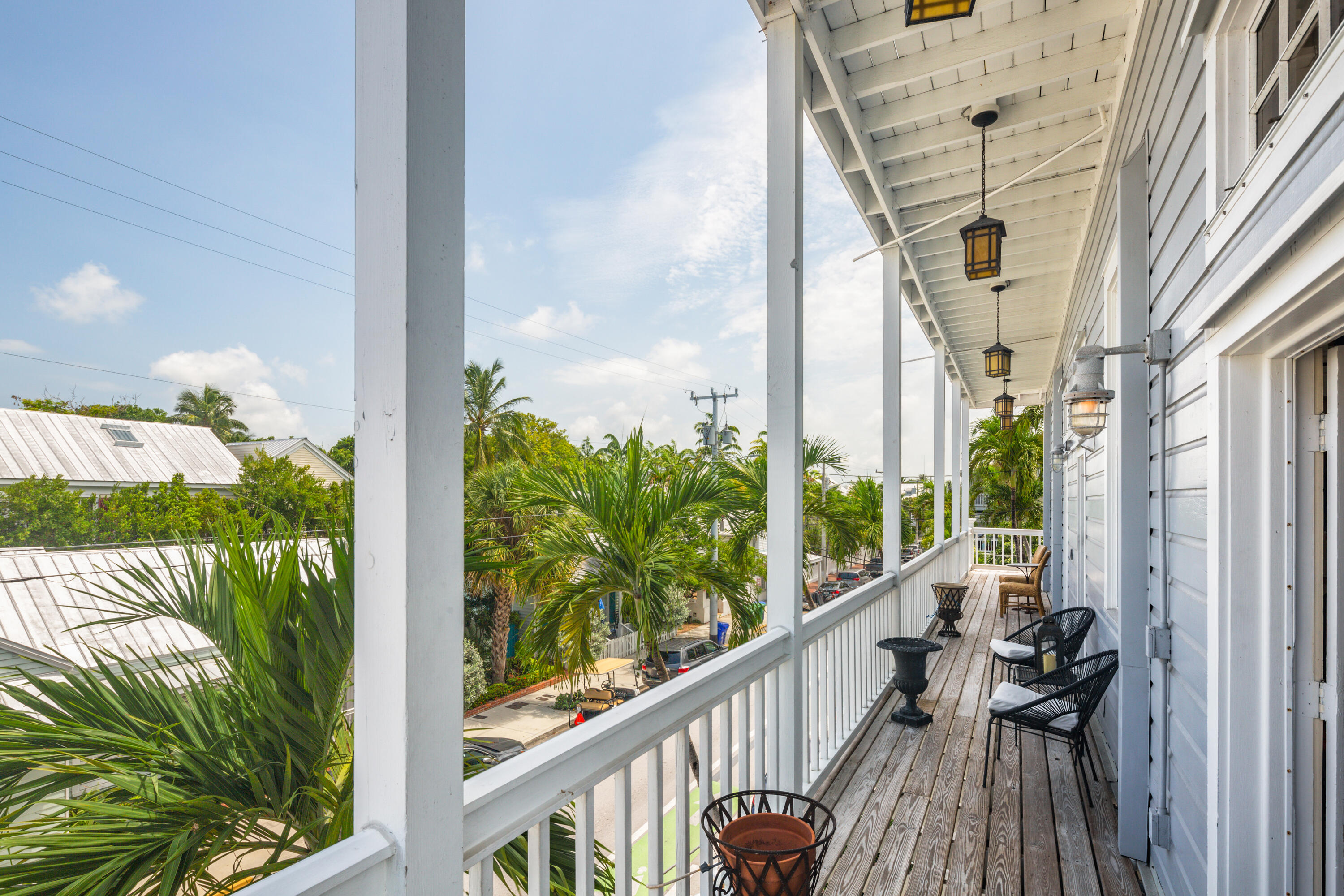 800 Fleming Street, Unit C2 Key West, FL 33040 - Photo 8 of 41 a view of a balcony with chairs