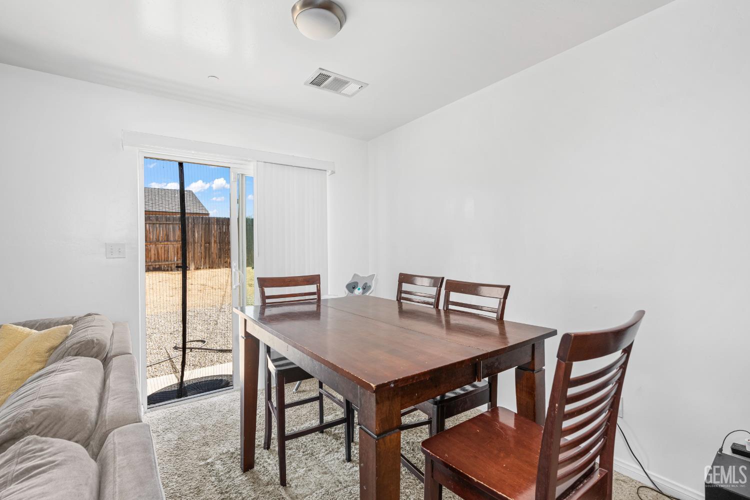 Undisclosed Address Bakersfield, CA 93306 - Photo 16 of 30 a view of a livingroom with furniture and window