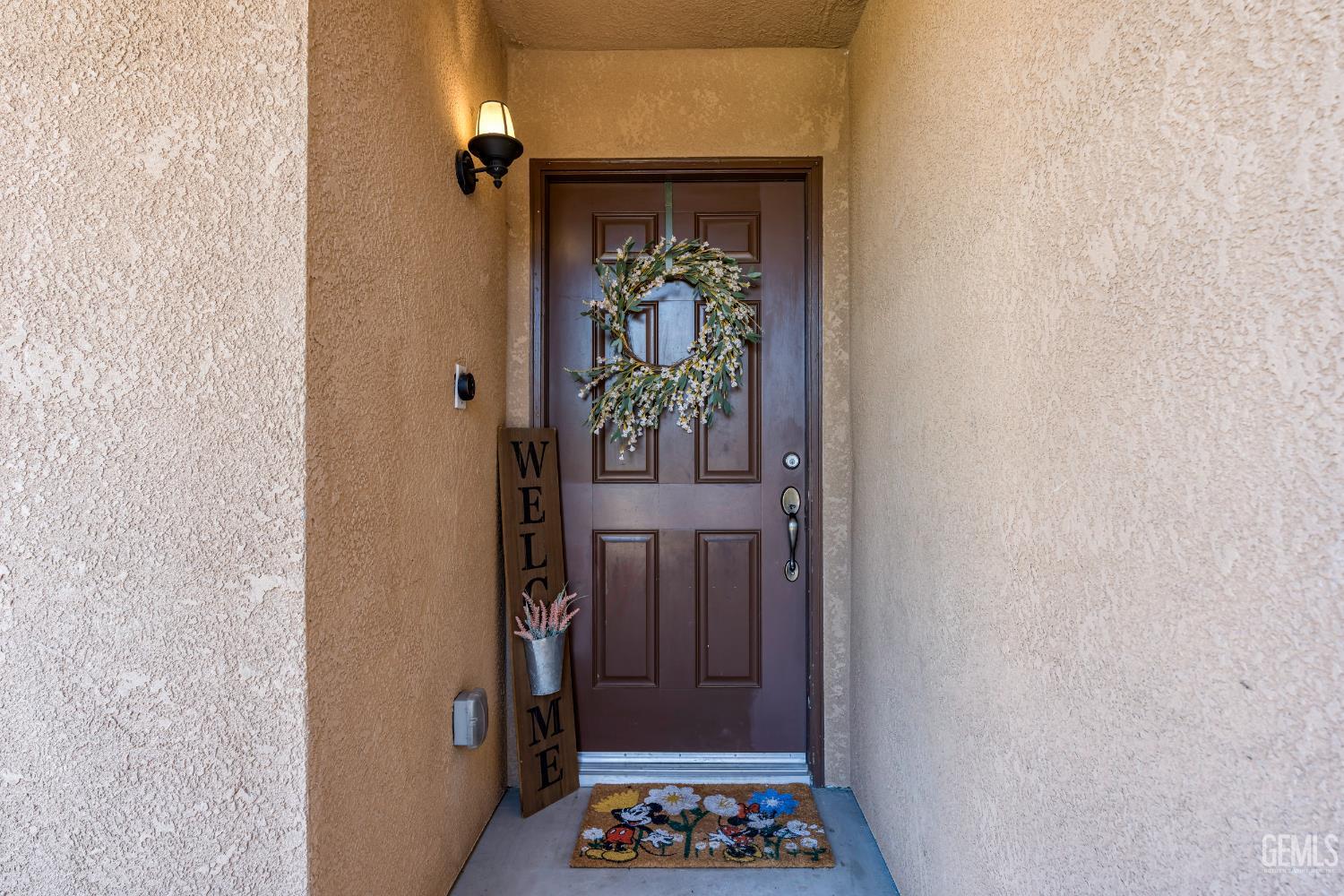 Undisclosed Address Bakersfield, CA 93306 - Photo 5 of 30 a view of a hallway with wooden floor and a dining room