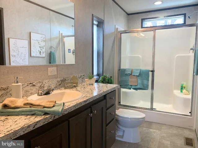 a bathroom with a glass door