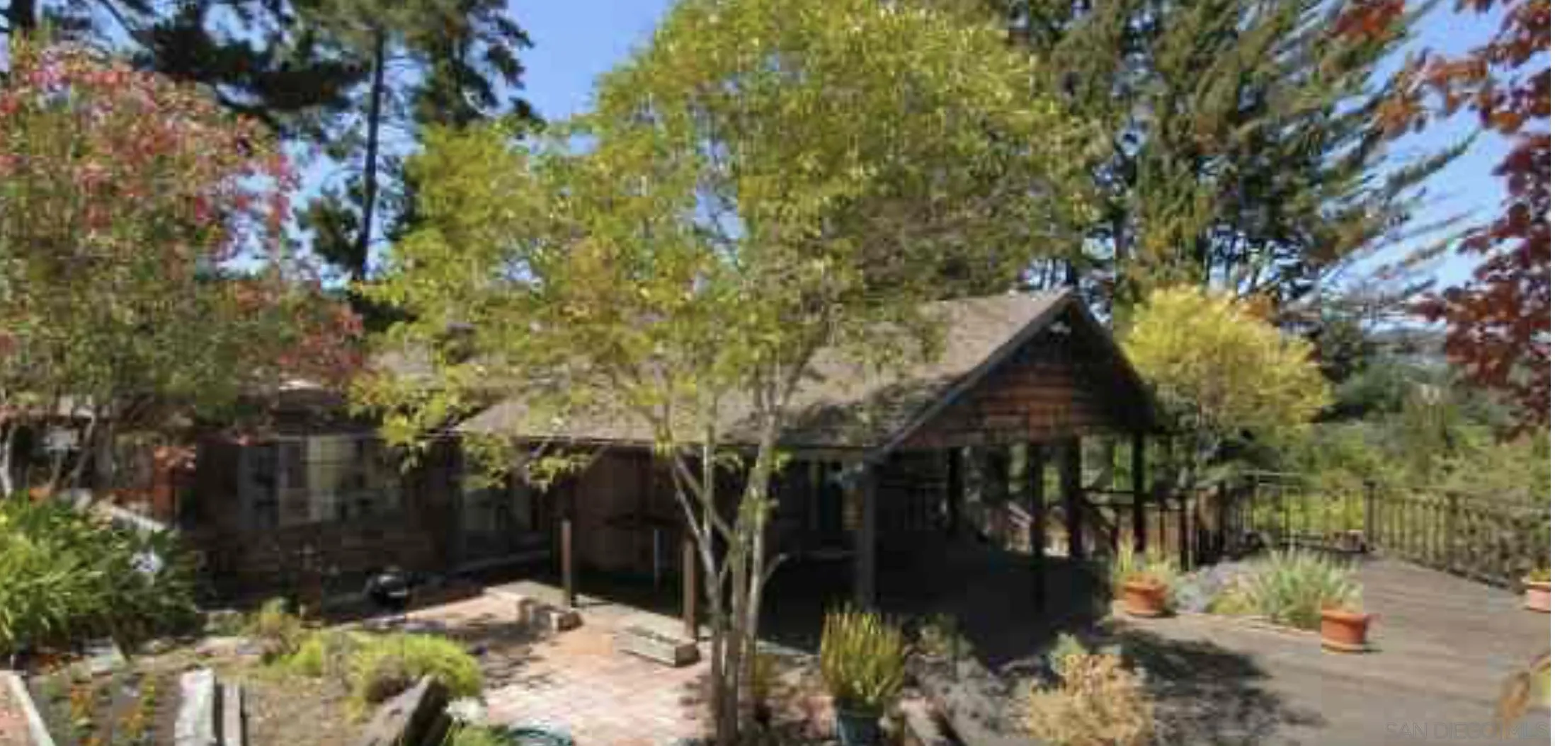 a view of outdoor space and covered with trees