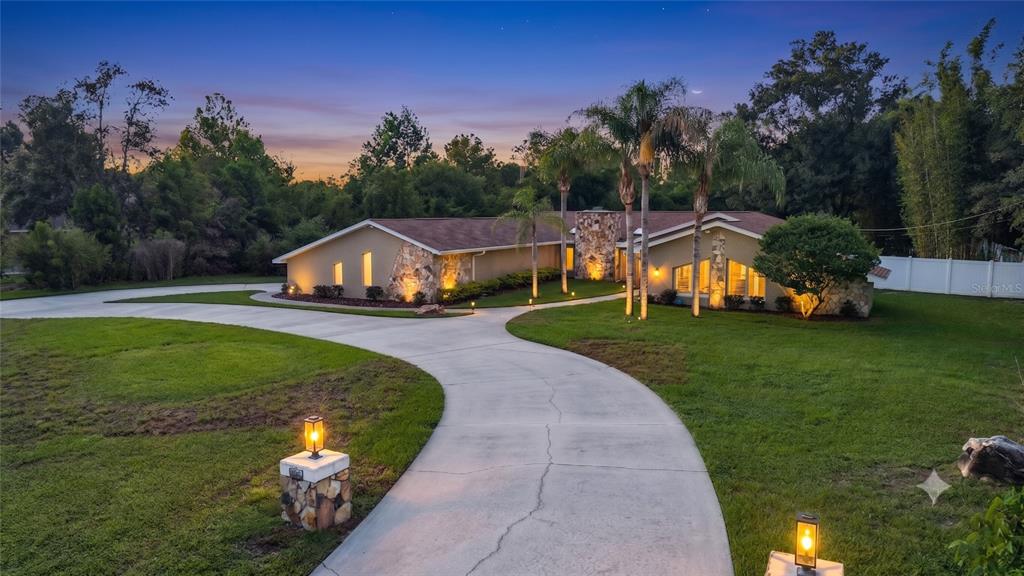 7487 River Country Drive Weeki Wachee, FL 34607 - Photo 3 of 53 a view of outdoor space yard and swimming pool