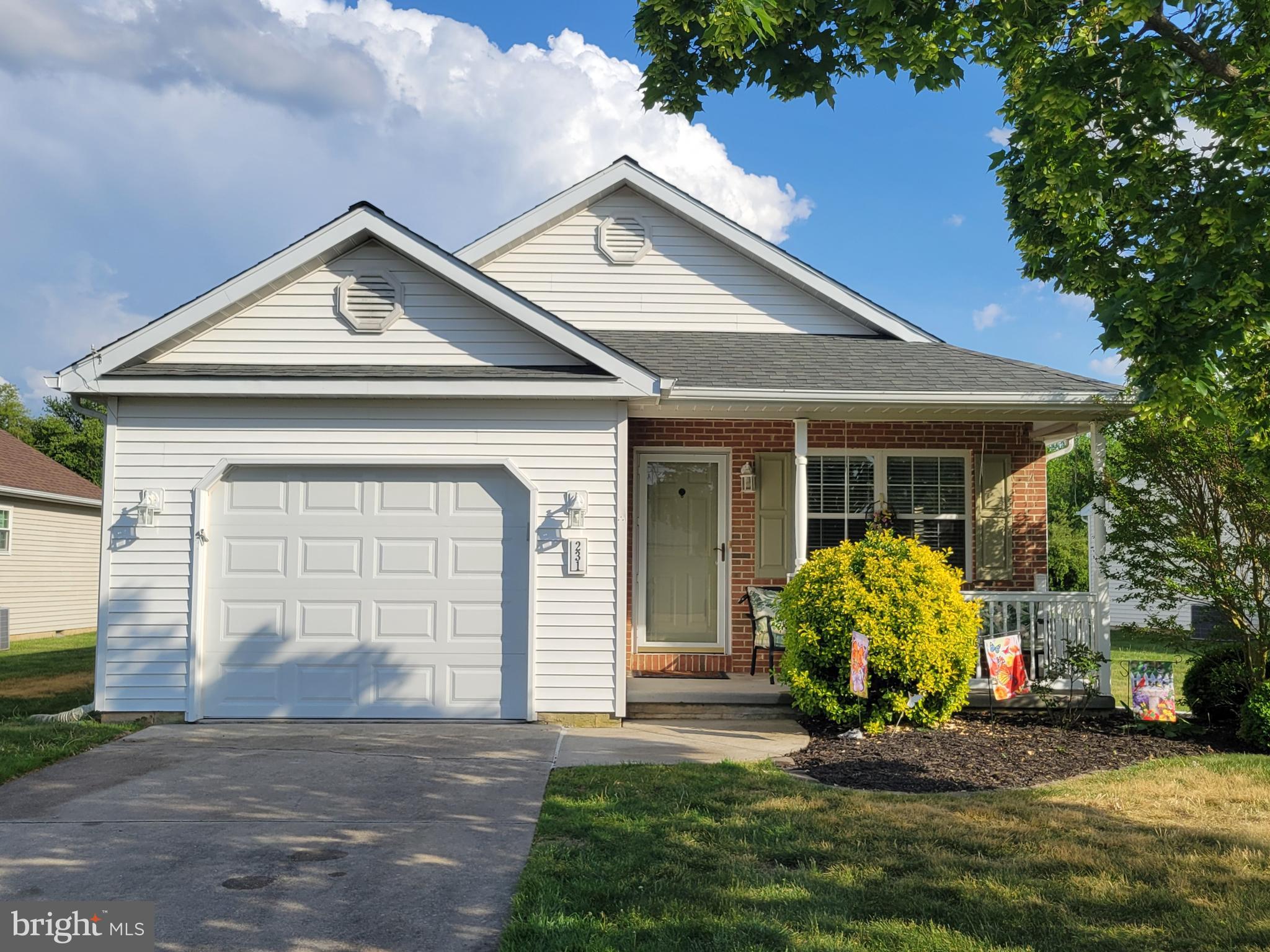 231 Gaunt Drive Mickleton, NJ 08056 - Photo 1 of 28 a front view of a house with a yard and garage
