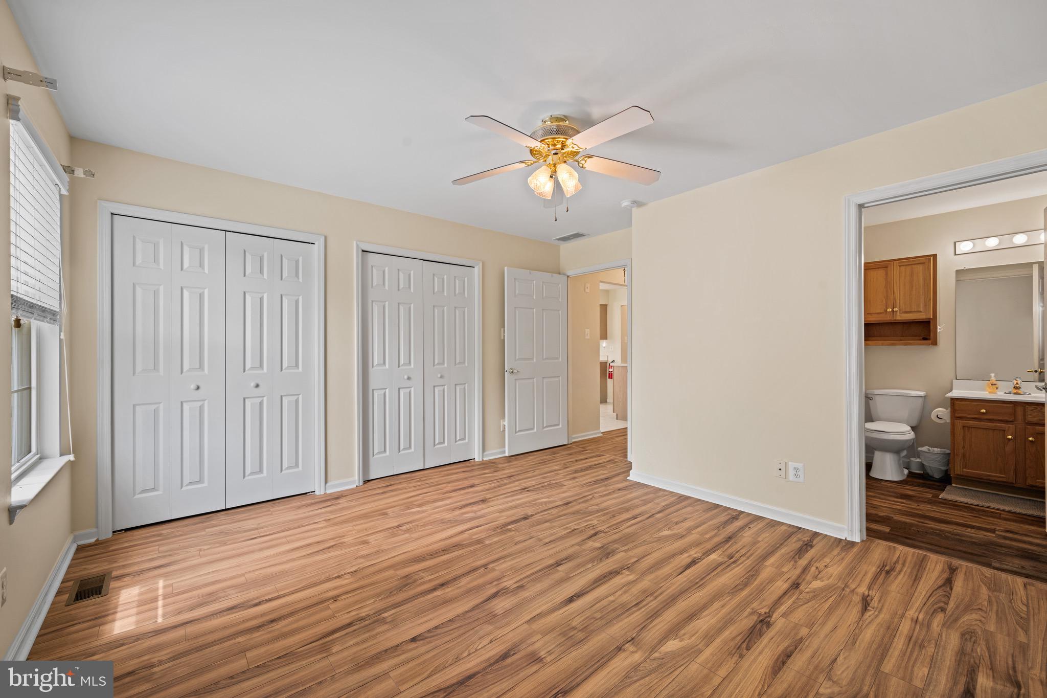 231 Gaunt Drive Mickleton, NJ 08056 - Photo 18 of 28 a view of empty room with wooden floor and fan