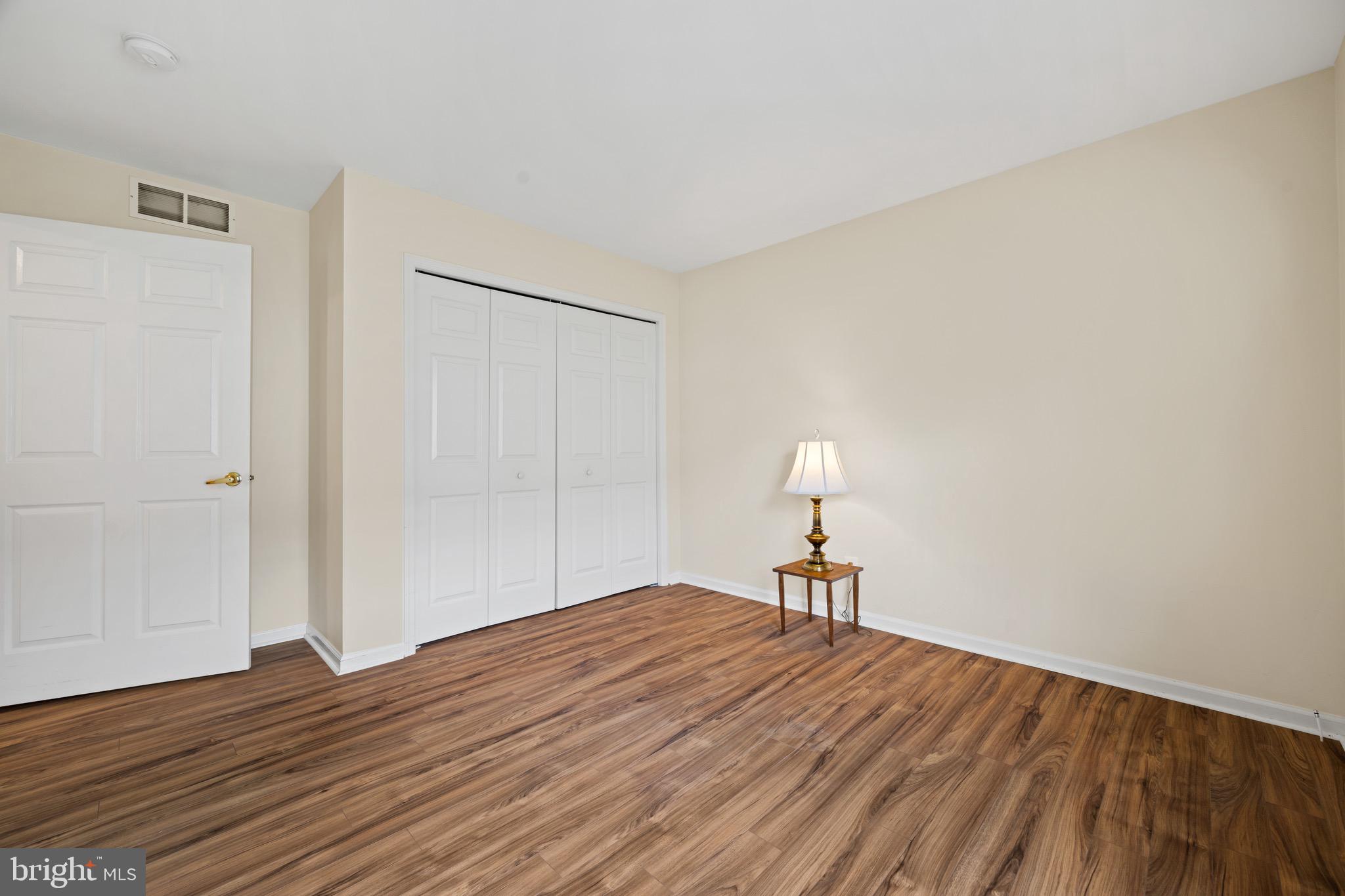 231 Gaunt Drive Mickleton, NJ 08056 - Photo 21 of 28 a bedroom with a bed and a chandelier