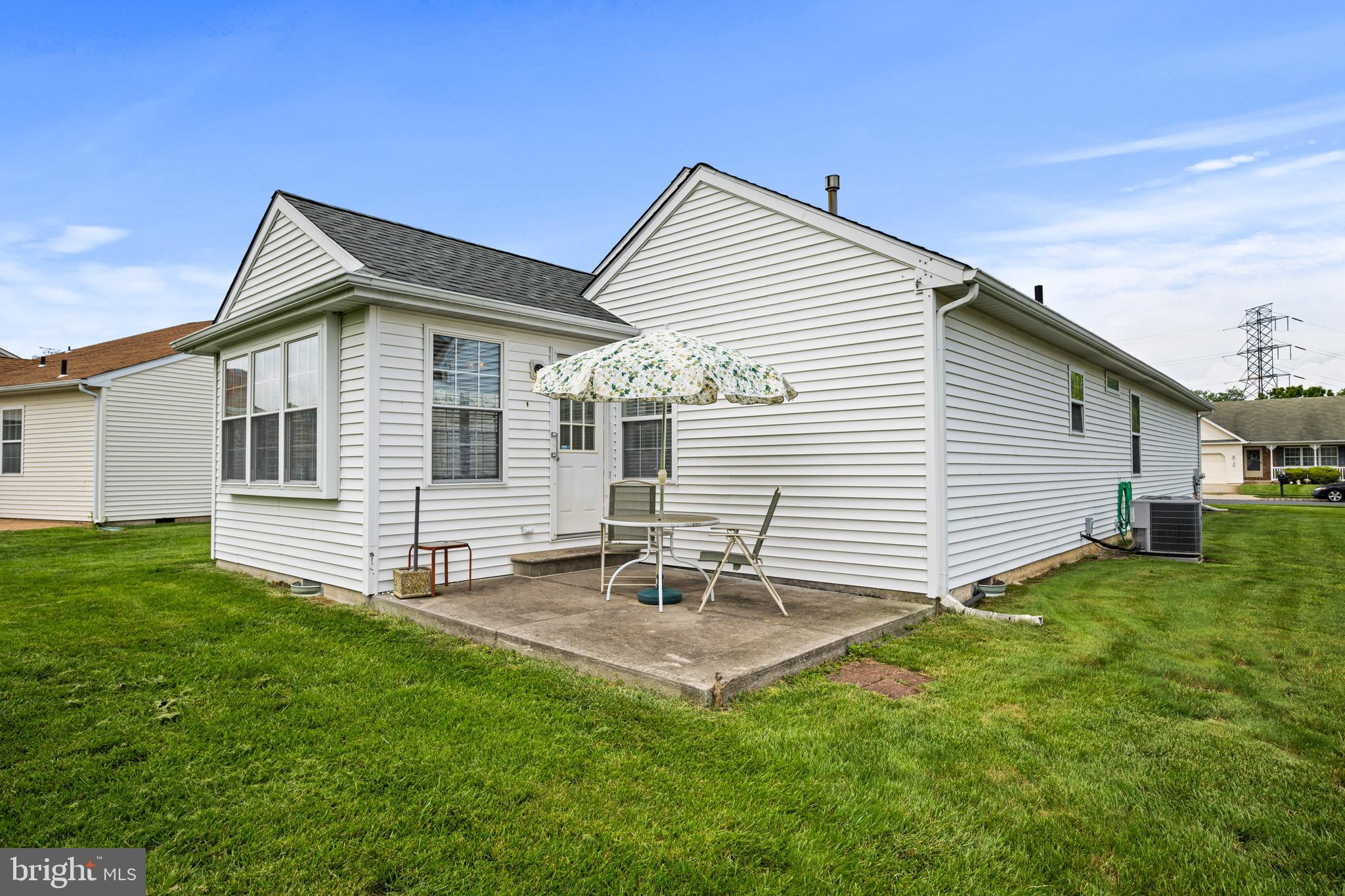 231 Gaunt Drive Mickleton, NJ 08056 - Photo 24 of 28 a backyard of a house with table and chairs