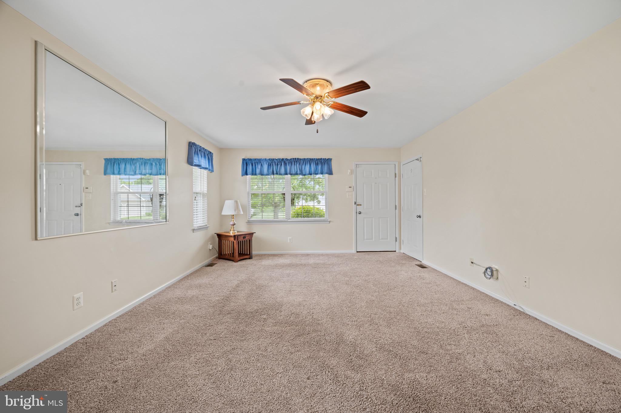 231 Gaunt Drive Mickleton, NJ 08056 - Photo 5 of 28 an empty room with windows and fan