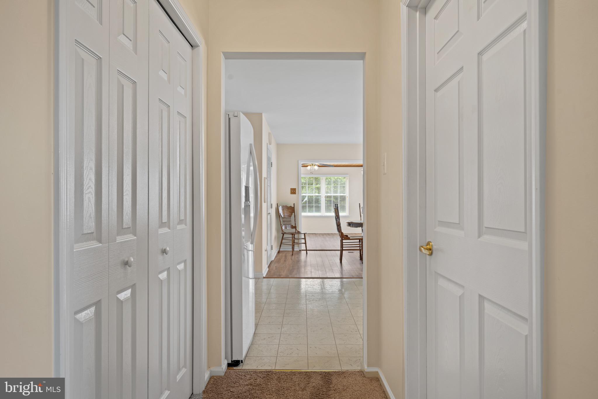 231 Gaunt Drive Mickleton, NJ 08056 - Photo 7 of 28 a view of a hallway with wooden floor and closet area