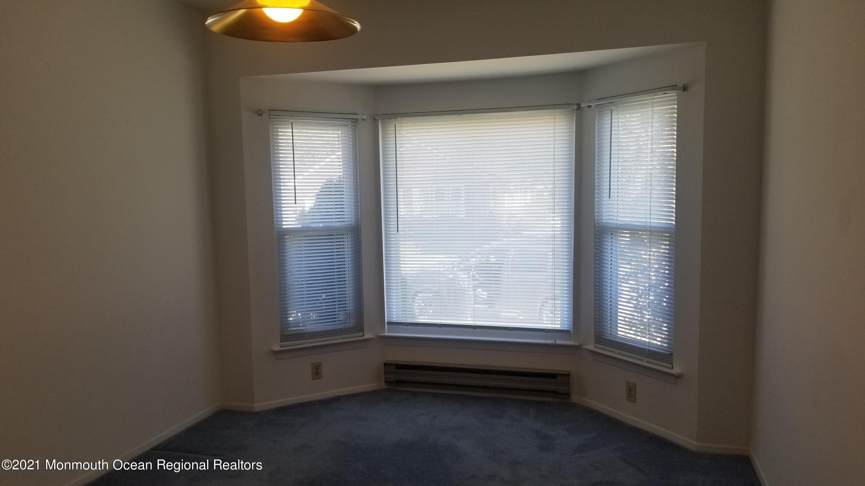 20D Ashley Road, Unit A Whiting, NJ 08759 - Photo 11 of 29 a view of an empty room with a window