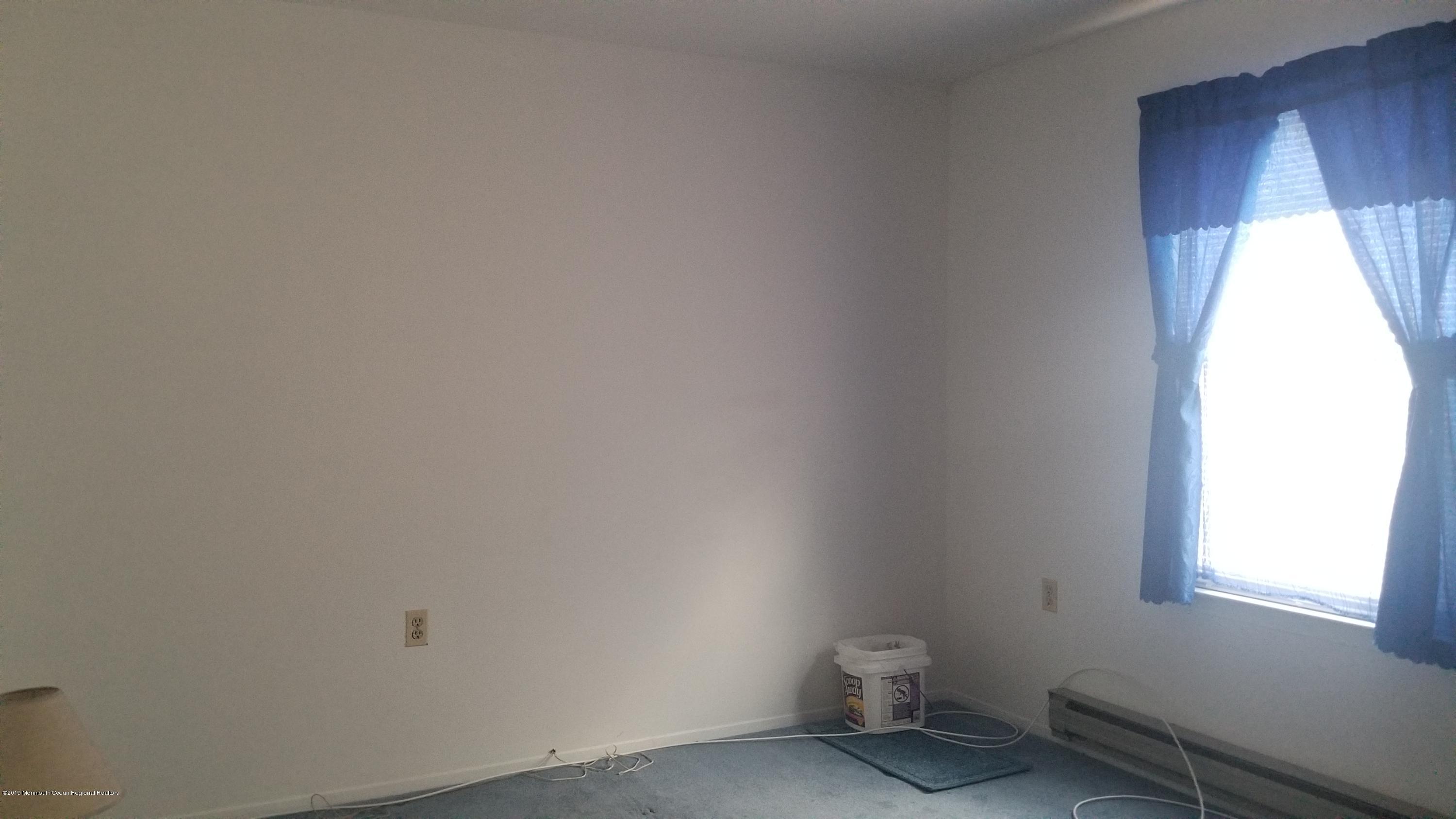 20D Ashley Road, Unit A Whiting, NJ 08759 - Photo 18 of 29 a bathroom with a toilet