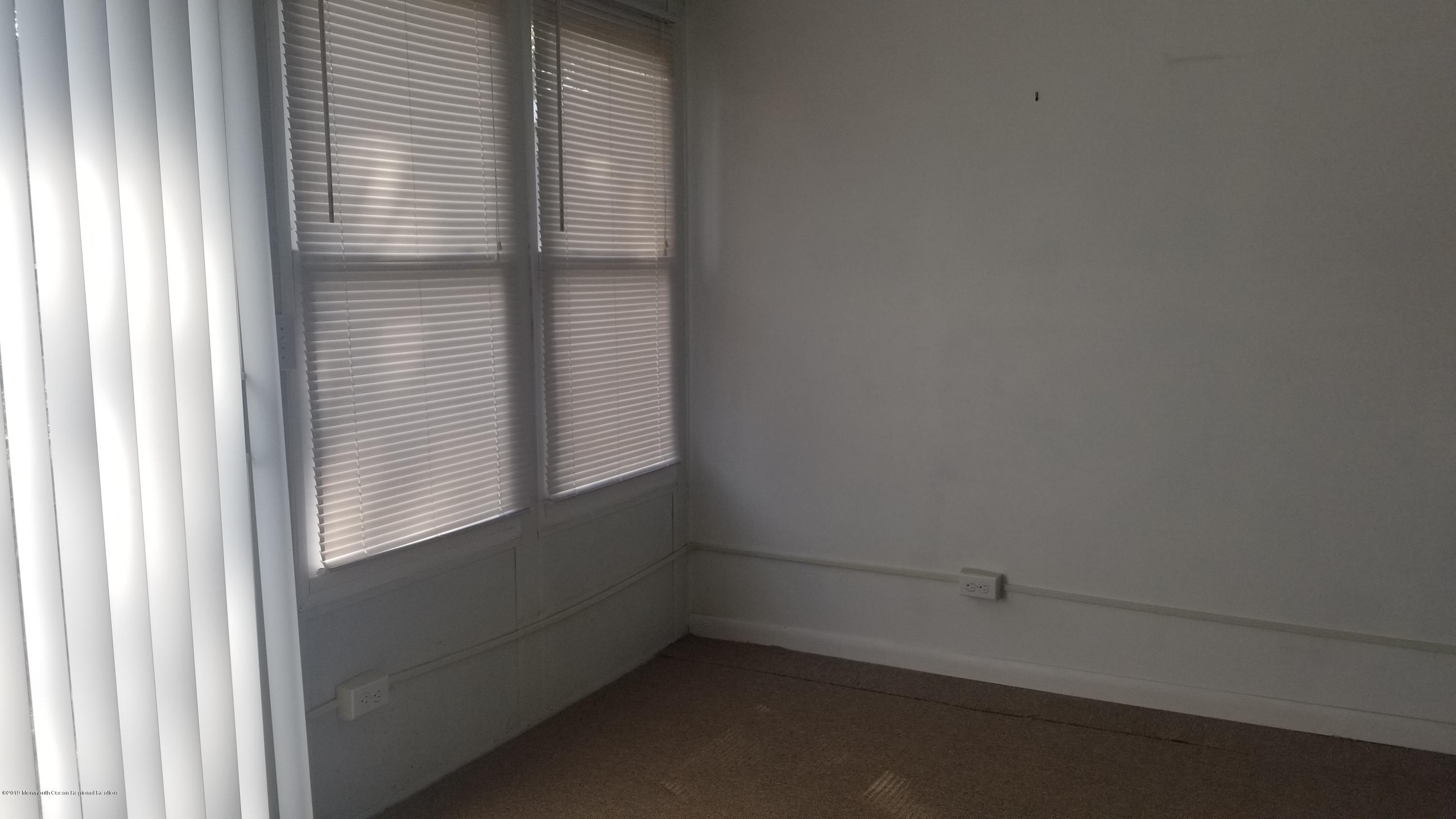 20D Ashley Road, Unit A Whiting, NJ 08759 - Photo 28 of 29 a view of an empty room with a window