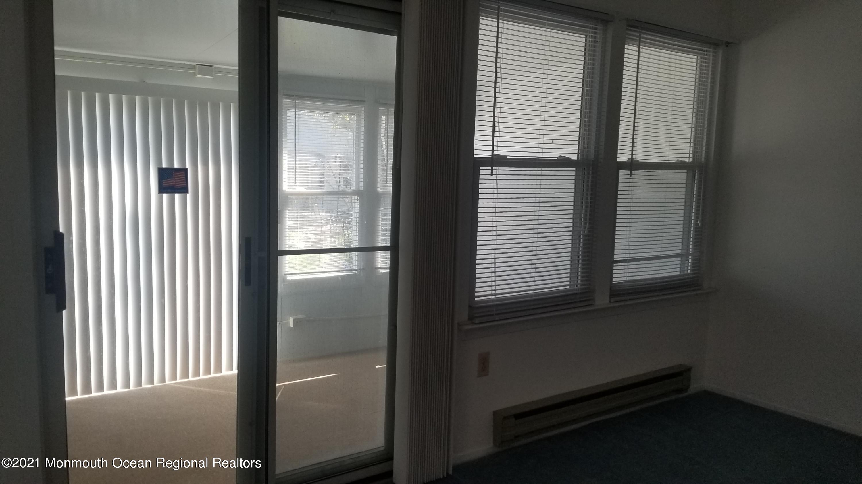 20D Ashley Road, Unit A Whiting, NJ 08759 - Photo 29 of 29 a bathroom with a window