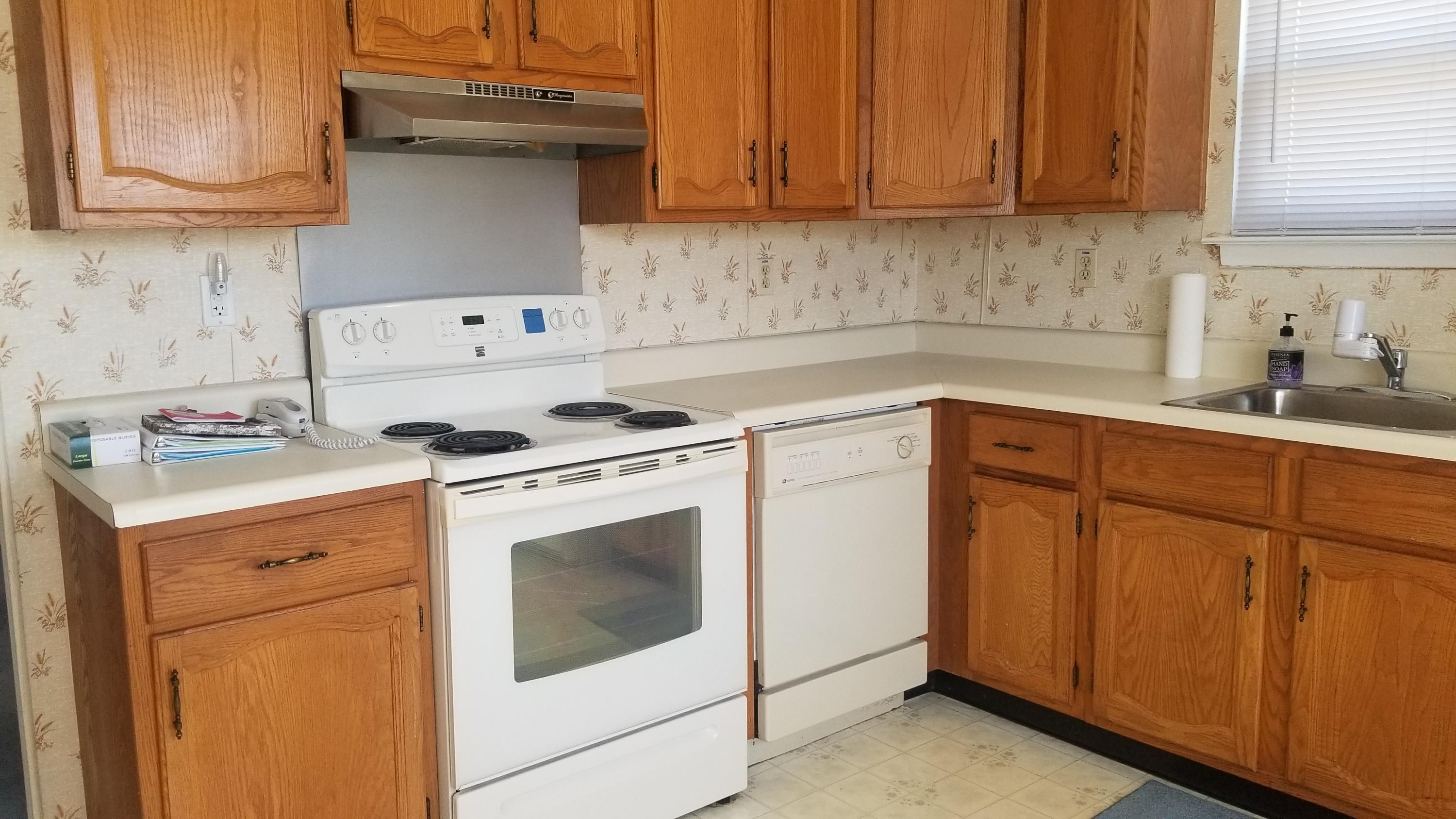 20D Ashley Road, Unit A Whiting, NJ 08759 - Photo 6 of 29 a kitchen with granite countertop cabinets stainless steel appliances and sink