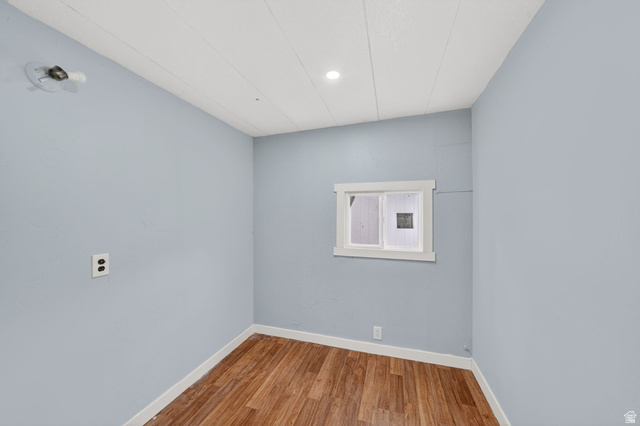 200 North Harrisville Road, Unit 37 Ogden, UT 84404 - Photo 11 of 14 Unfurnished room with baseboards and light wood finished floors