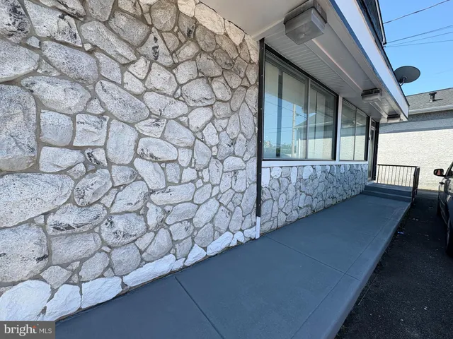 a view of a yard from a balcony