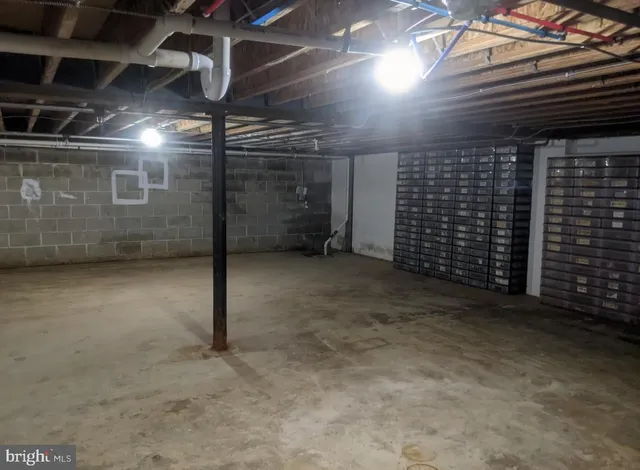 a view of a kitchen with wooden floor and a sink