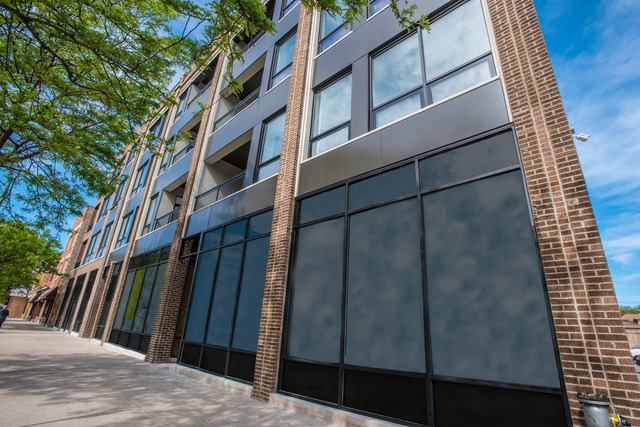 a view of a building from a balcony