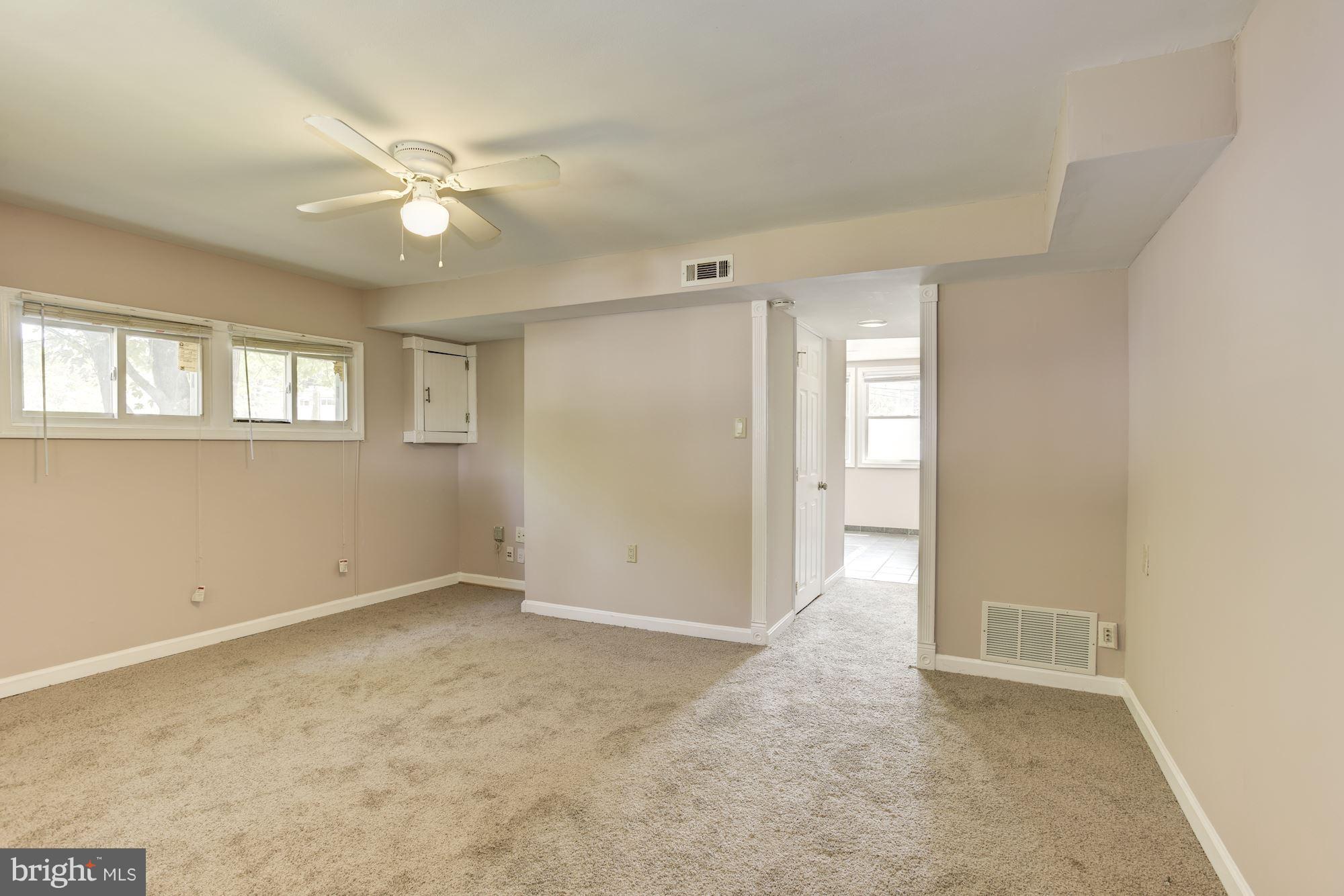 330 Bigley Avenue Halethorpe, MD 21227 - Photo 11 of 24 Living Room showing entrance to kitchen