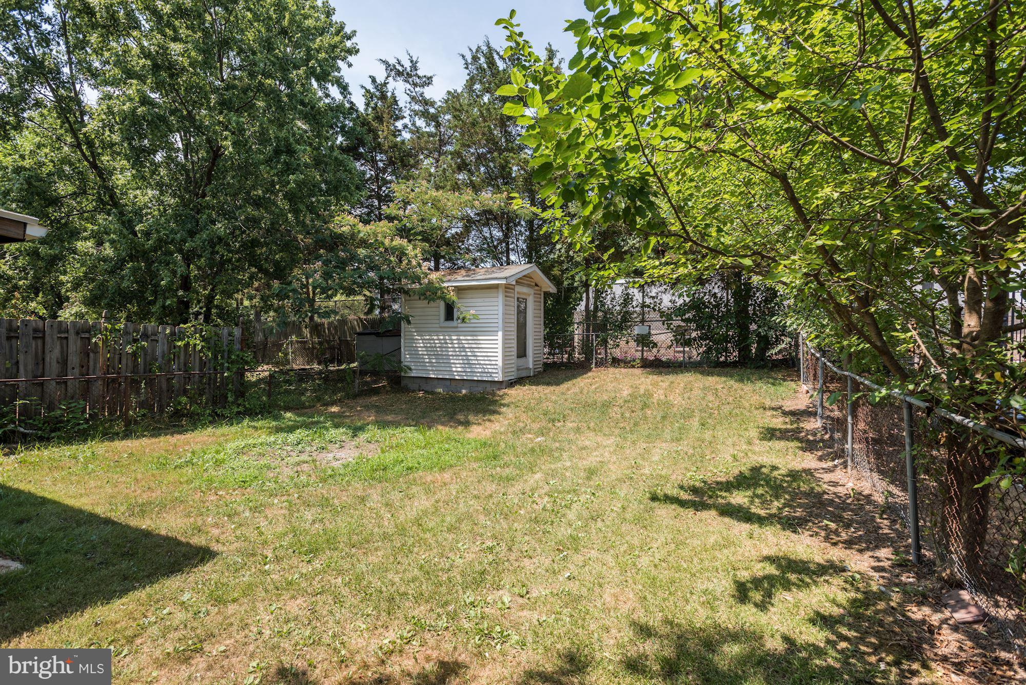 330 Bigley Avenue Halethorpe, MD 21227 - Photo 17 of 24 Exterior (Rear) big back fenced yard