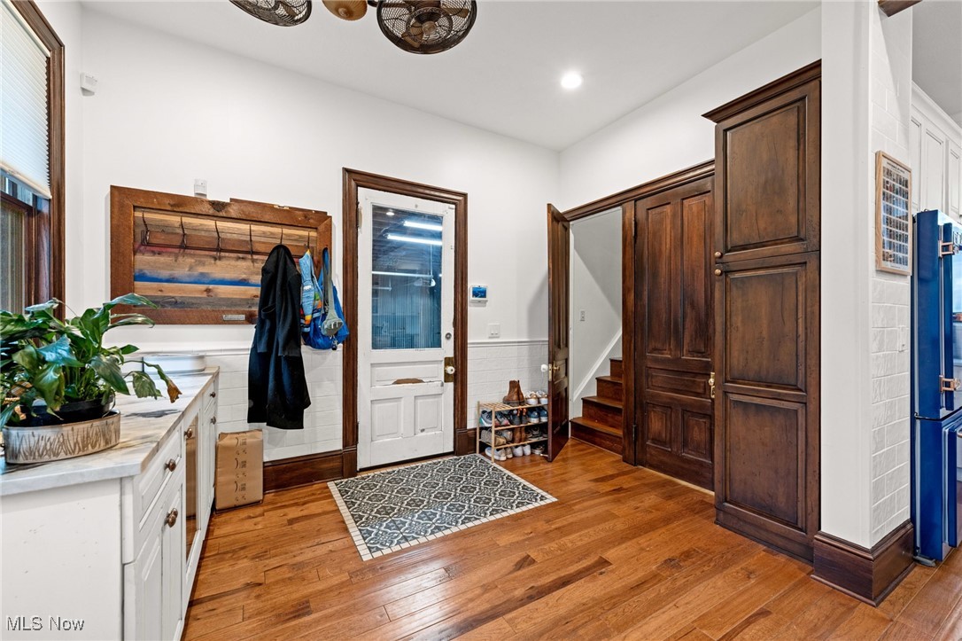 3210 Scranton Road Cleveland, OH 44109 - Photo 18 of 50 Entrance from garage with light wood-style floors, recessed lighting, and stairs