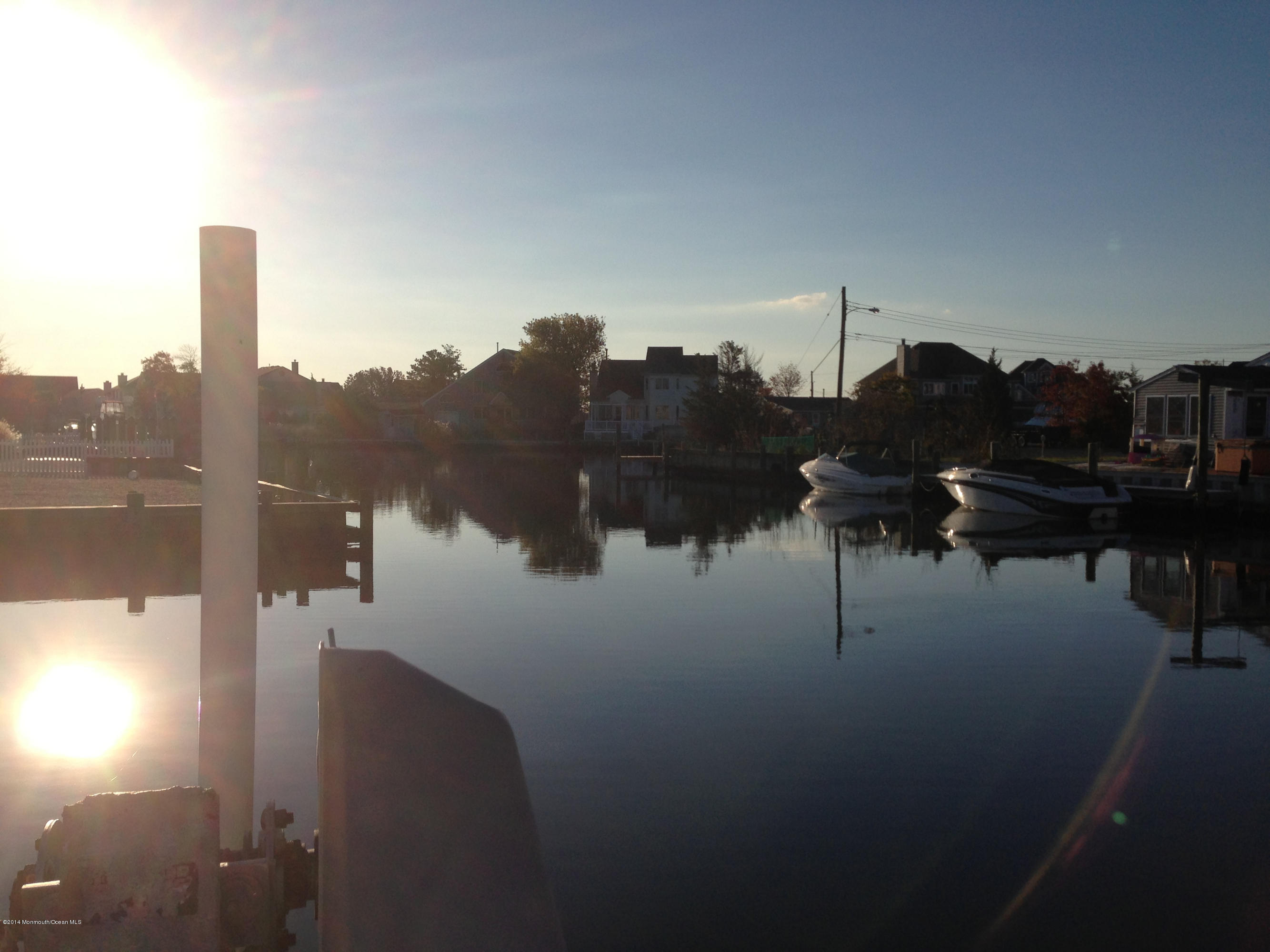 27 Cross Trees Road Brick, NJ 08723 - Photo 14 of 17 a view of a lake from balcony
