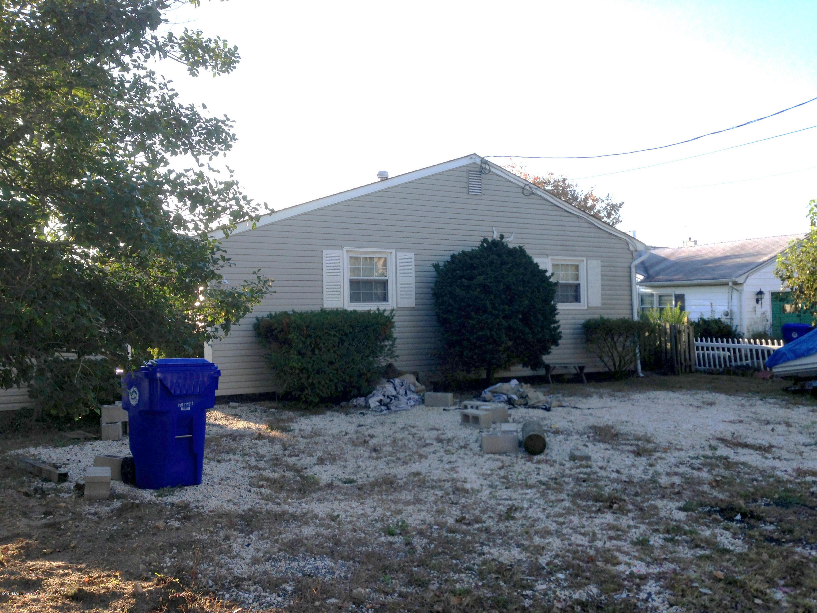 27 Cross Trees Road Brick, NJ 08723 - Photo 16 of 17 a view of a house with a yard
