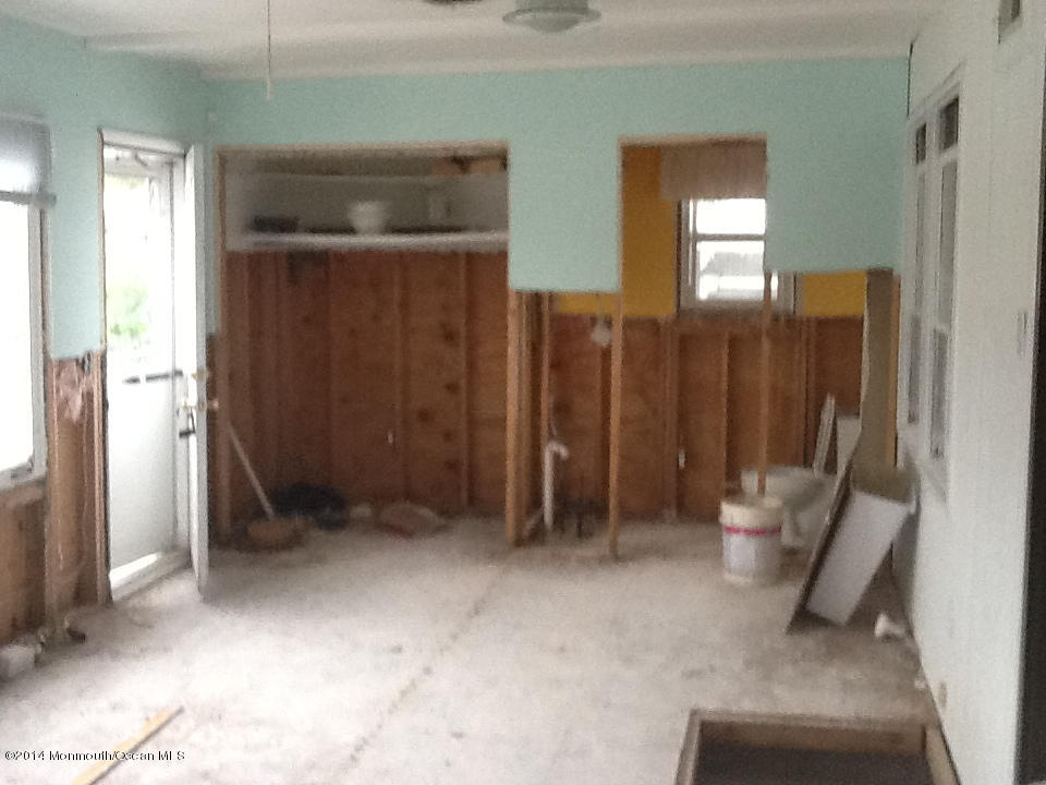 27 Cross Trees Road Brick, NJ 08723 - Photo 3 of 17 an empty room with windows