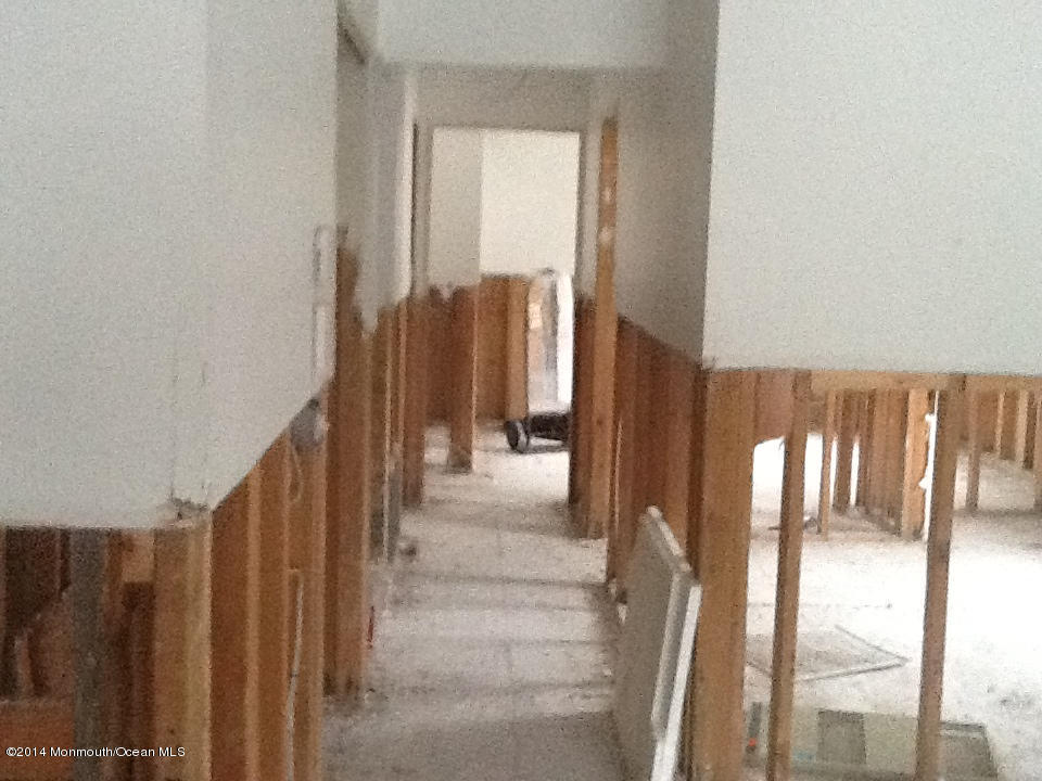 27 Cross Trees Road Brick, NJ 08723 - Photo 4 of 17 a view of hallway with wooden floor