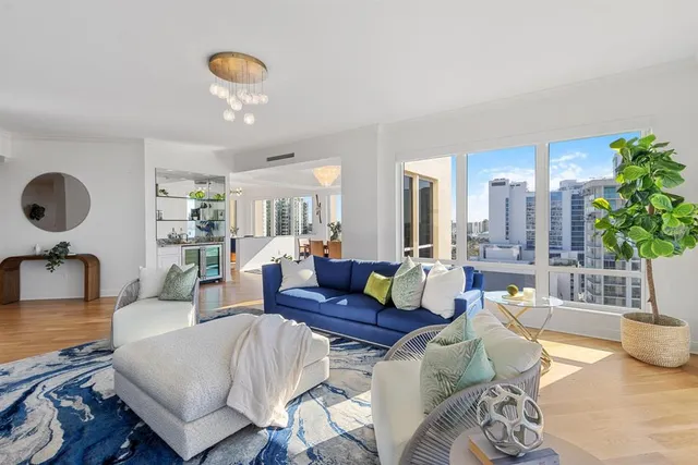 a large kitchen with a table and chairs