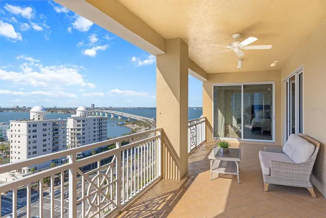 a dining room with furniture window and wooden floor