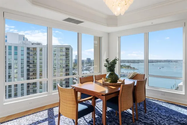 a kitchen with sink and cabinets