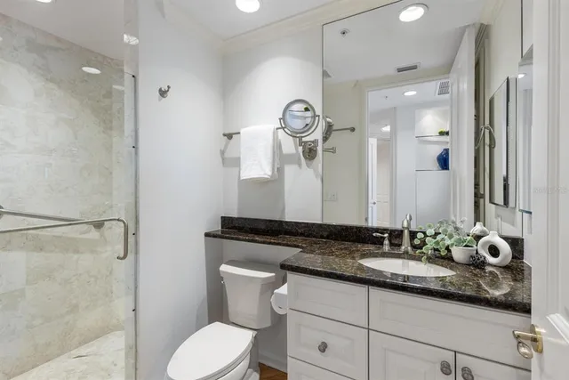 a balcony with furniture and city view